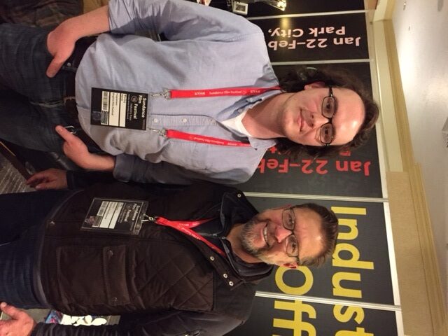 VFF Programming Staff at Sundance Film Festival: Two men with festival badges smile for the camera.