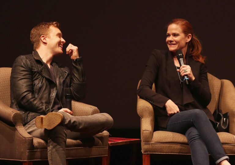 Actors sitting at the Virginia Film Festival on stage.