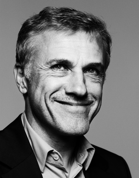Christoph Waltz, actor and special guest at the 2018 VAFF, smiling in a black and white portrait.