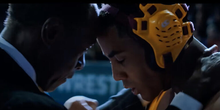 Jharrel Jerome in 'Unstoppable' gets coaching from his wrestling coach.