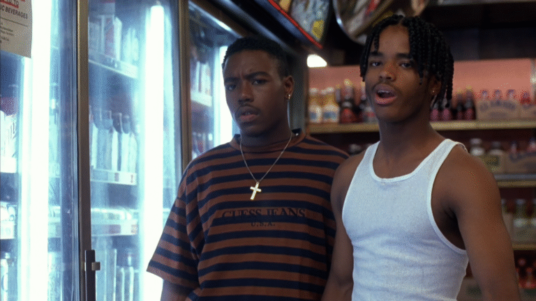 Scene from Menace II Society with two young Black men in a store.