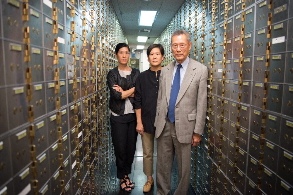 The Sung family in a bank vault for "Abacus: Small Enough to Jail