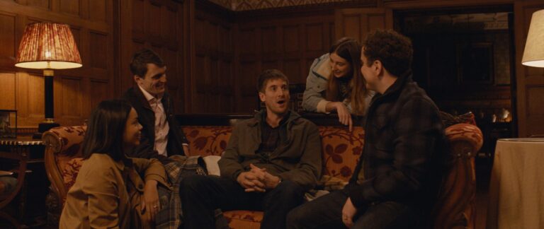 Group of friends gathered indoors, as seen in "All My Friends Hate Me.