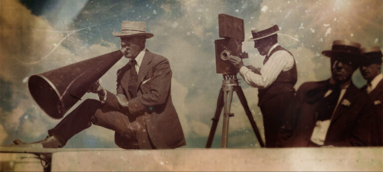 Vintage photo of early filmmakers with camera, megaphone, and straw hats, capturing the "Birth of a Movement.