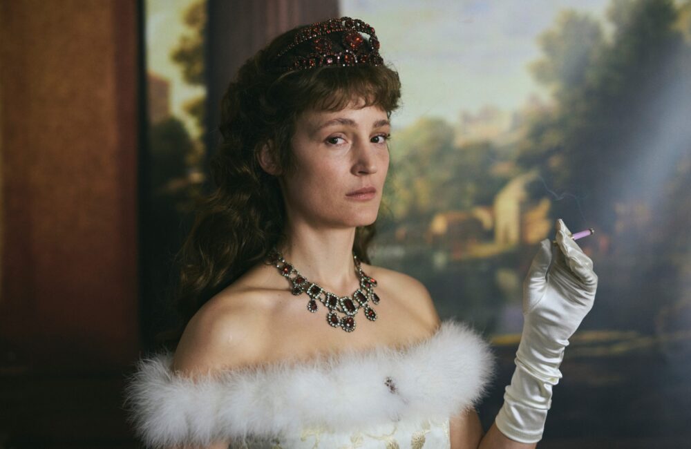 Vicky Krieps as Empress Elisabeth in "Corsage," smoking