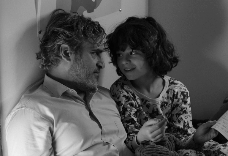 Joaquin Phoenix with child actor from the movie.