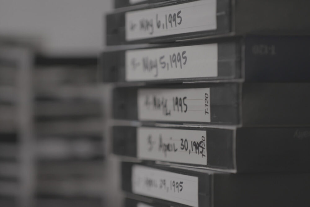 VHS tapes labeled with dates from April and May 1995.