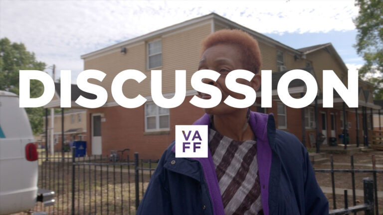 Heard Discussion: Woman in front of brick apartment building. VAFF logo.