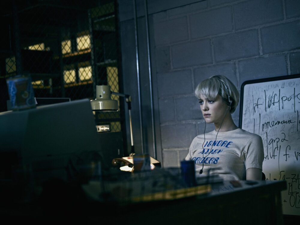Mackenzie Davis as Cameron Howe in Halt and Catch Fire, working at her computer.