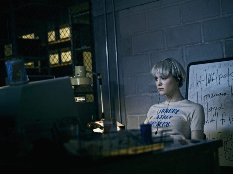 Mackenzie Davis as Cameron Howe in Halt and Catch Fire, working at her computer.