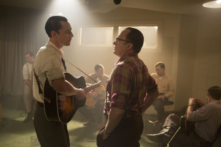 Michael Shannon and Tom Hiddleston in "I Saw the Light," a music-filled scene.
