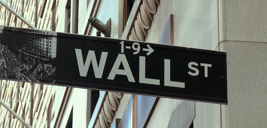 Wall Street street sign in New York City, directing to 1-9 Wall St.