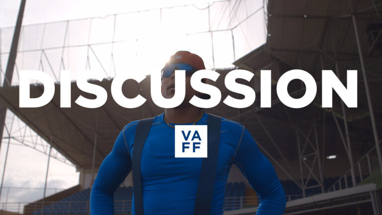 The Last Out discussion: Baseball player in blue shirt with stadium background.