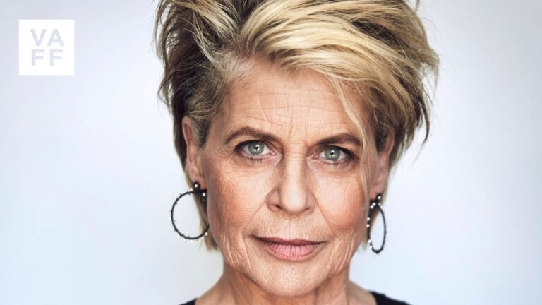 Linda Hamilton portrait, close-up of the actress with short blonde hair.