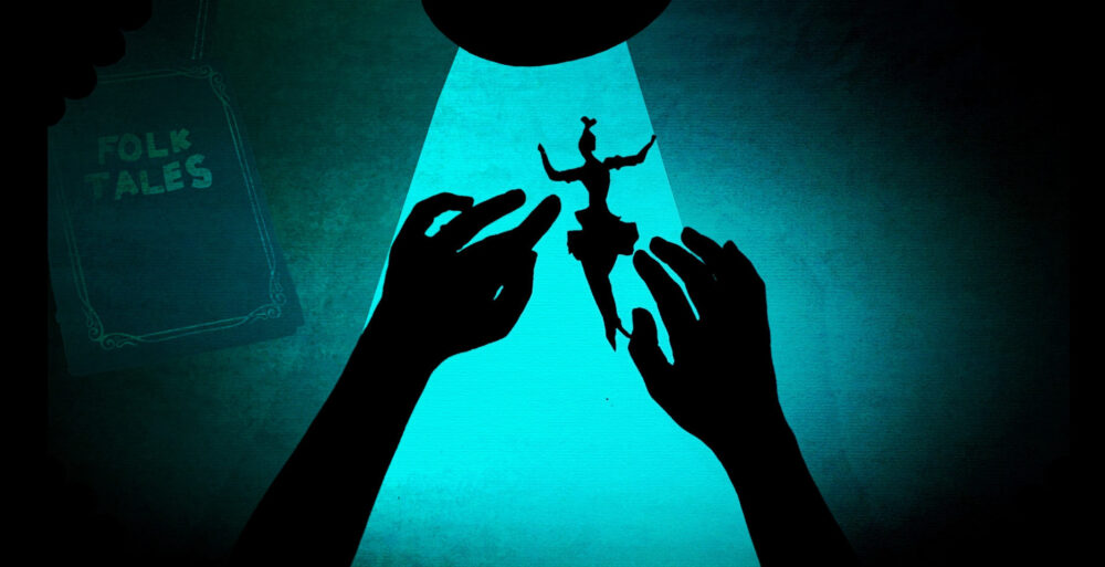 Shadow puppet show with a dancer figure and a "Folk Tales" book.