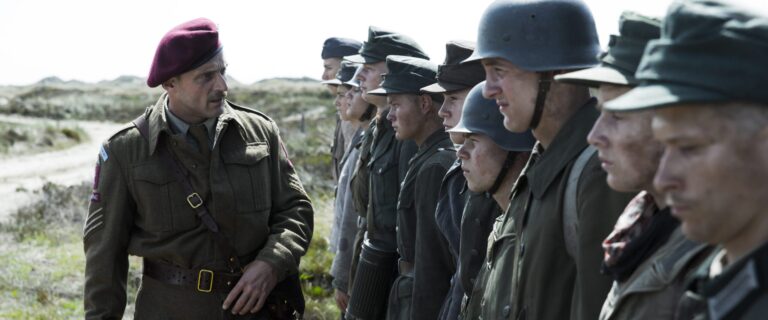 British officer in "Land of Mine" overseeing German POWs.