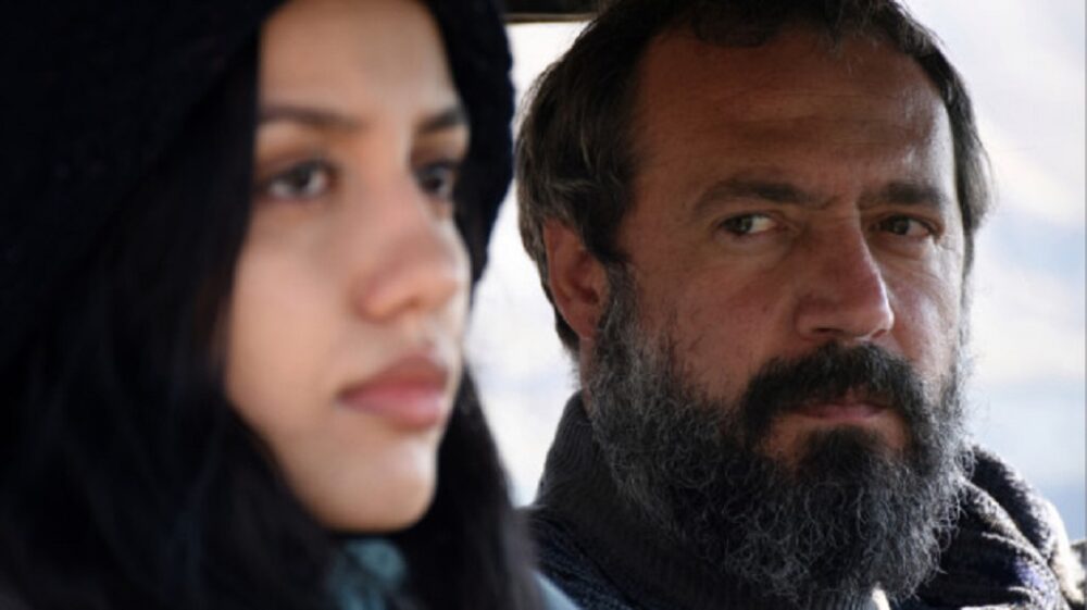 Man with beard and young woman in film "There Is No Evil.