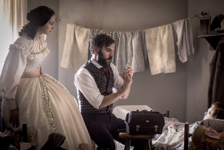 Man with syringe, woman in dress, "Mercy Street" scene