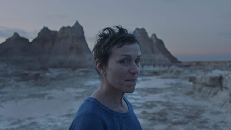 Frances McDormand in Nomadland, Badlands backdrop