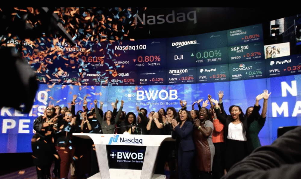 Black Women on Boards at Nasdaq, celebrating with confetti. BWOB logo visible.