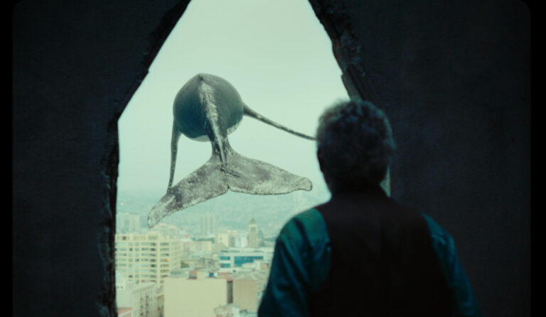 Whale seen through broken window in Oblivion Verses film.