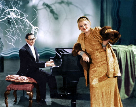 Sophie Tucker with a pianist, vintage publicity shot.