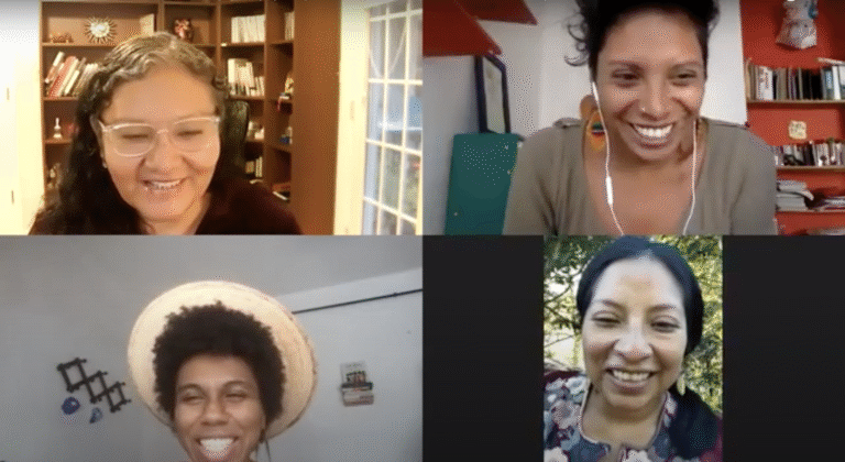Four women in a video call discussing Transborder Blackness & Indigeneity.