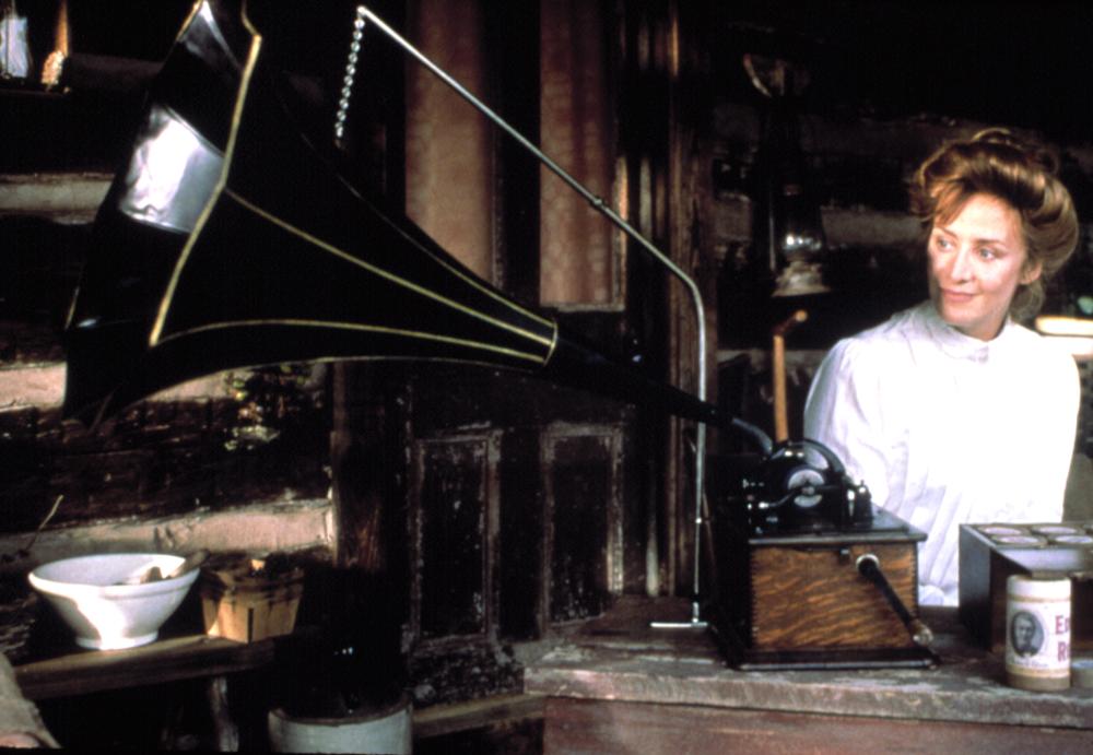 Woman listens to an antique phonograph in Songcatcher.