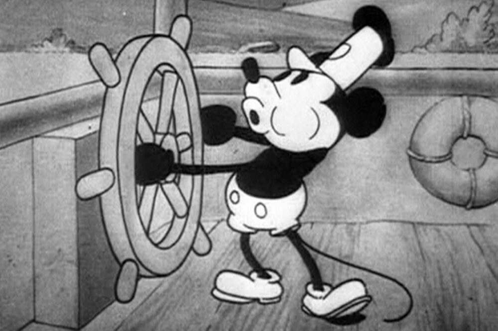 Mickey Mouse as Steamboat Willie at the ship's wheel, classic animation.