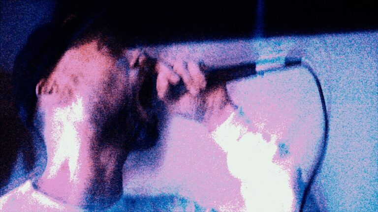 Abstract, blurred portrait with pink and blue tones. The Stage.