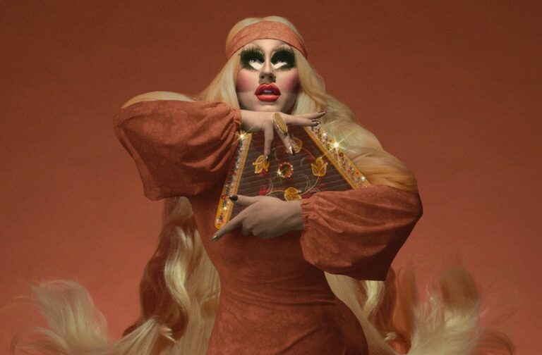 Trixie Mattel in drag with a musical instrument.