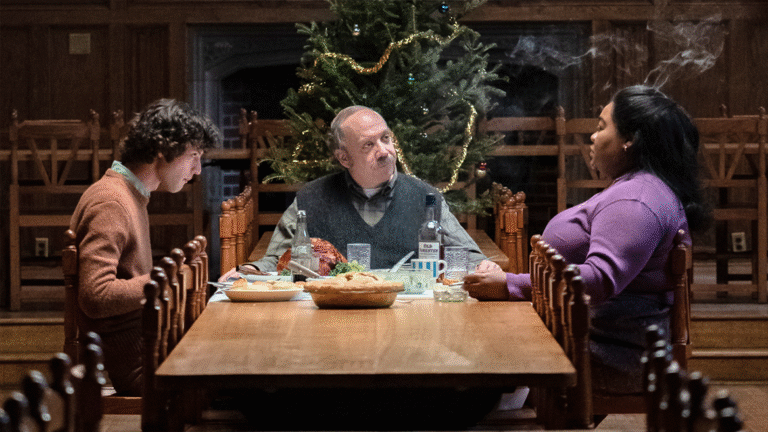 The Holdovers film scene: three people at a Christmas dinner table.
