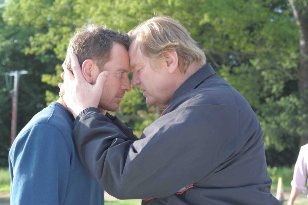 Michael Fassbender and Brendan Gleeson face-to-face in "Trespass Against Us"