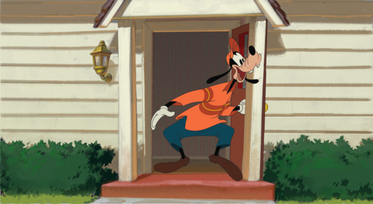 Goofy stands in a doorway, orange shirt and blue pants.