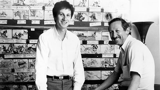 Don Hahn and Peter Schneider, Disney executives, stand in front of a storyboard for "Waking Sleeping Beauty"
