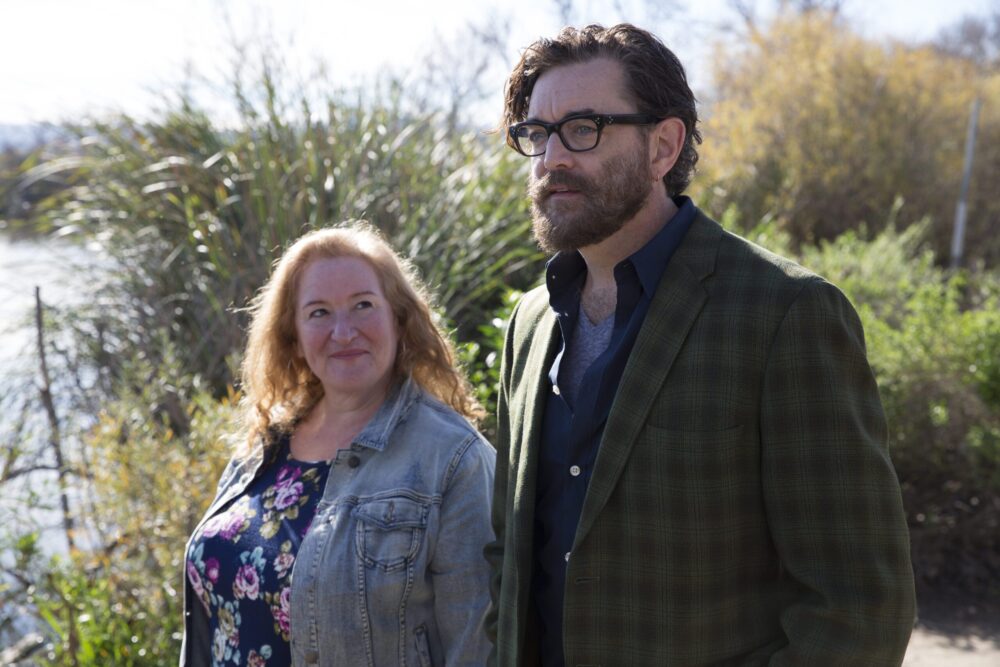 Actor Olivia Colman with co-star in Wild Honey, outdoors.