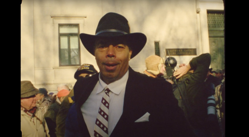 Man in hat and suit at Richmond, VA, January 13th event.