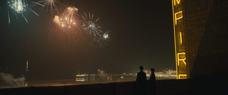 Fireworks over Brighton Pier, Empire of Light, silhouettes of two people.