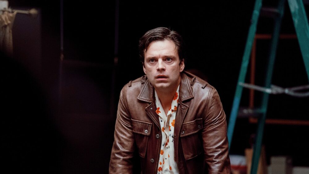 Sebastian Stan in "A Different Man" with a concerned expression.