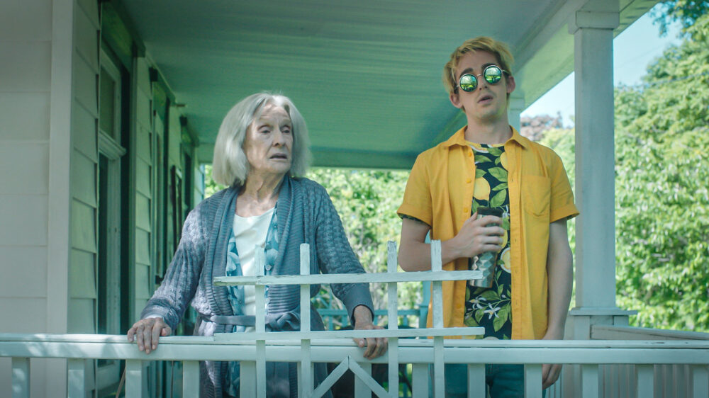 Scene from "Jump, Darling": Cloris Leachman with a younger man on a porch.
