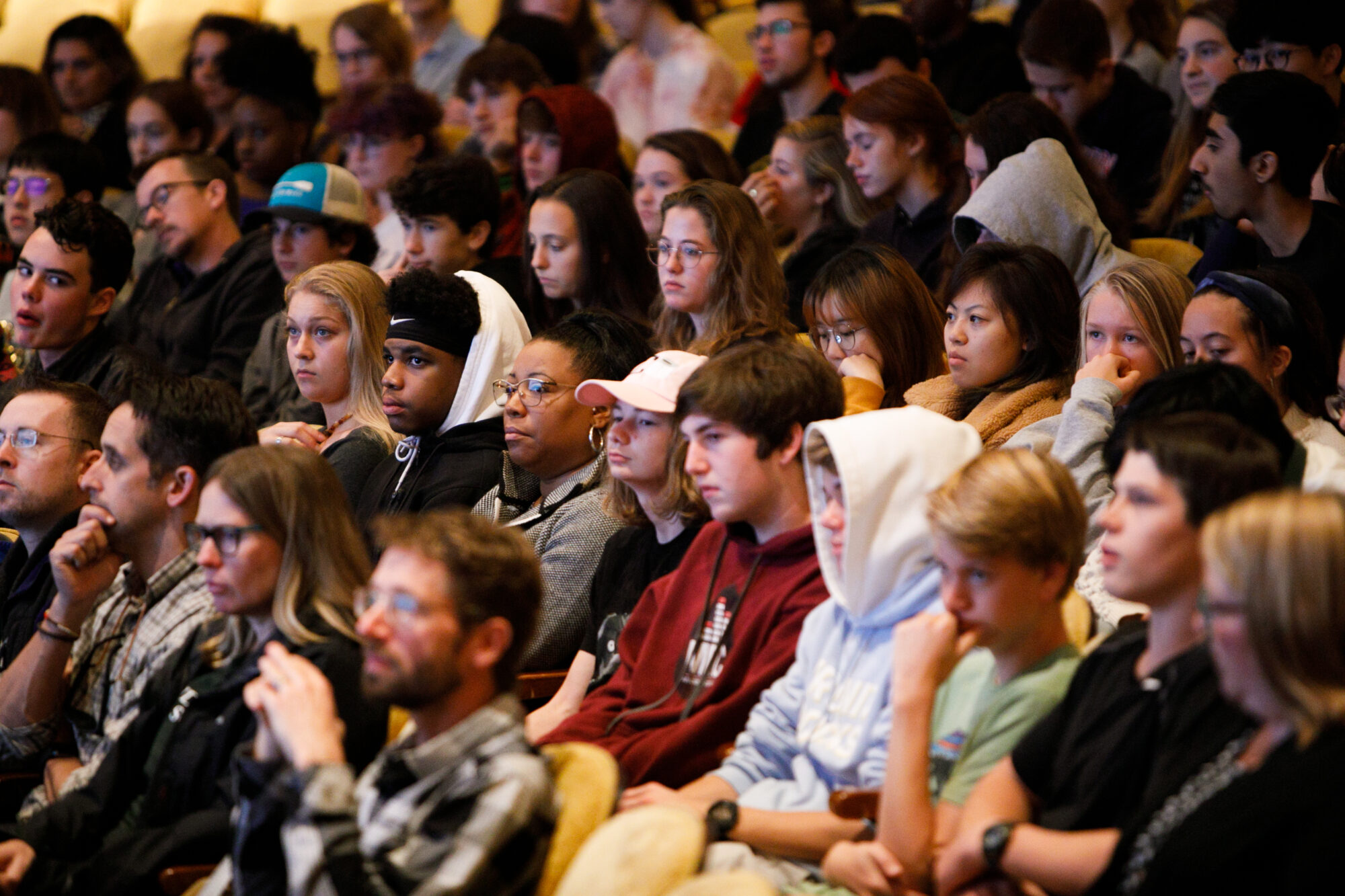 Audience at NEA event, attentively watching the stage