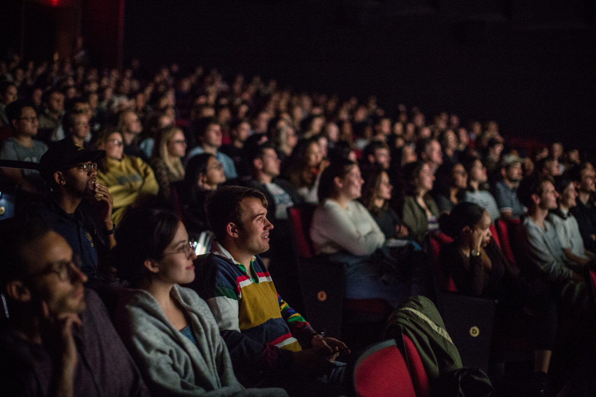 Audience attentively watching a performance. NEA 2021 event.