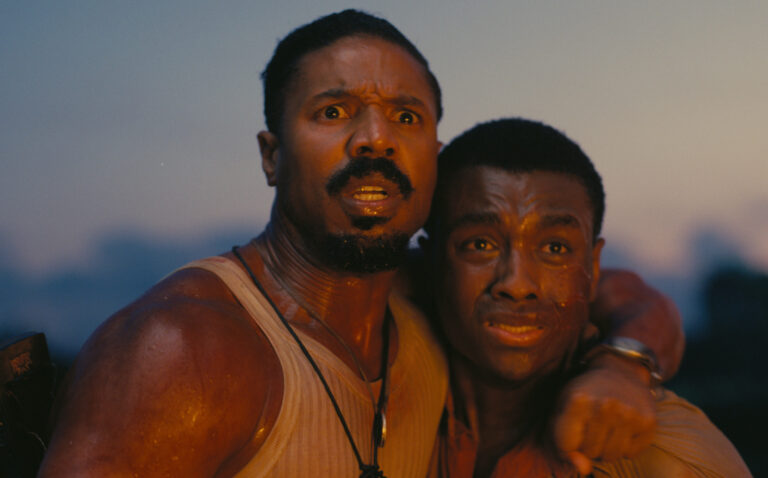 Michael B. Jordan and Yahya Abdul-Mateen II in a tense scene, possibly related to "Sinners" event.