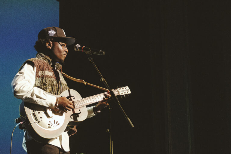Miles Caton playing guitar at SINNERS screening.