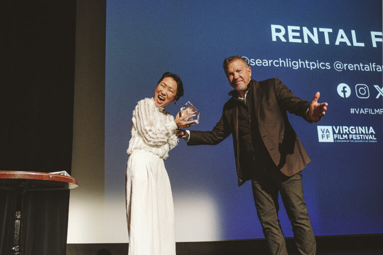 Hikari accepting an award at the Virginia Film Festival for 'Rental Family'.